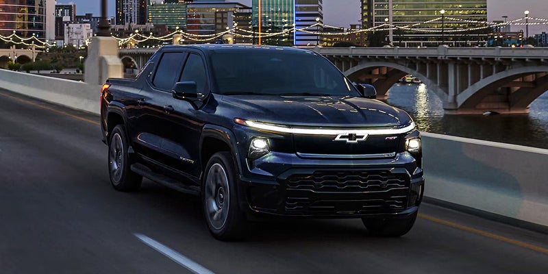 Image of a 2025 Chevrolet Silverado-EV driving on the bridge