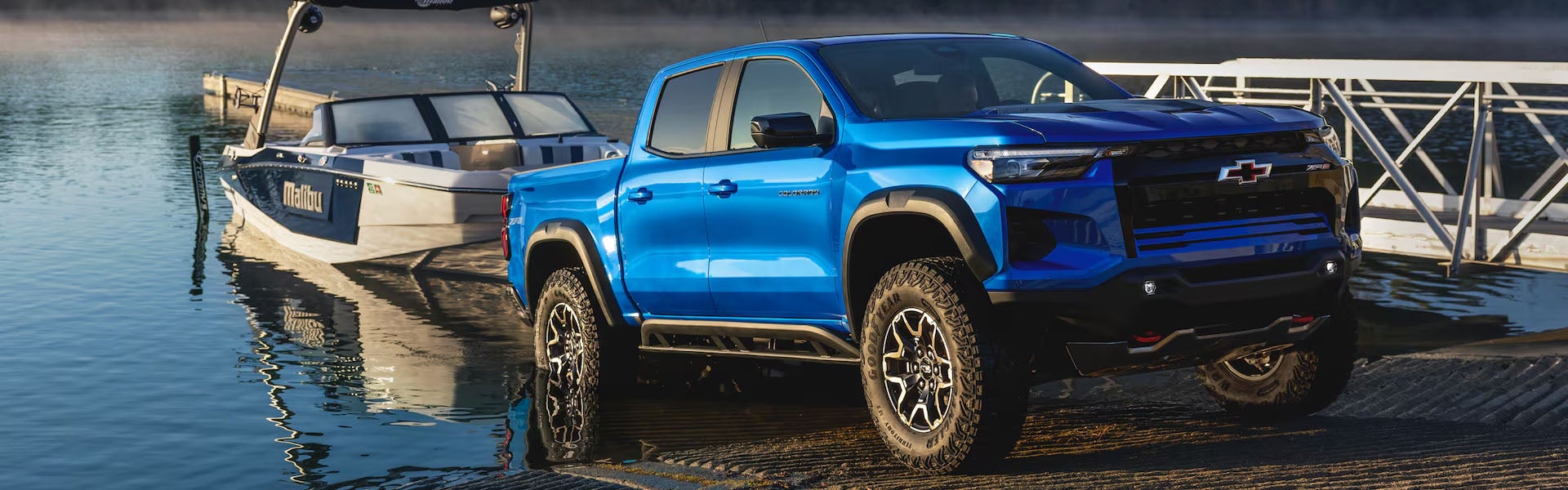 2026 Chevrolet Colorado ZR2 towing a boat from a lake dock