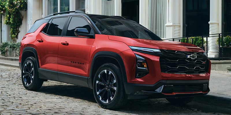 2027 Chevrolet Equinox parked in profile on an open paved surface