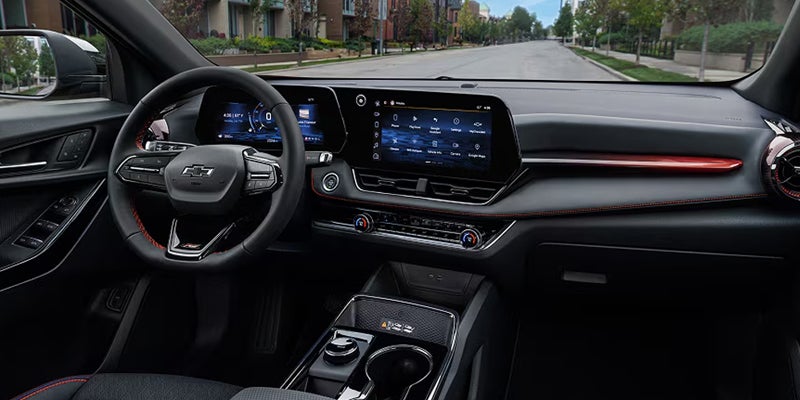 2027 Chevrolet Equinox interior showing the dashboard and front seating area
