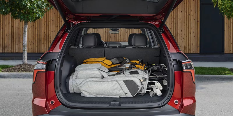 2027 Chevrolet Equinox front seats and center console viewed from the passenger side